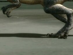 Medium tracking-left zoom-in zoom-out - A graphic shows a dinosaur slowly walking as it hunts for prey. / Dallas, Texas, USA Stock Footage