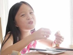 Little Girl Eating Yummy cake. Stock Footage