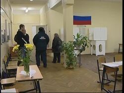 WRAP Exit polls show landslide for Putin's party; homeless voting; counting News Clip