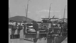 British aircraft carrier approaching Korean port during Korean War News Clip