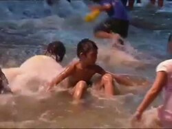 Children Play in Flood Waters News Clip