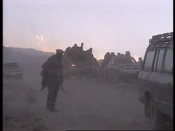 Afghanistan: Destroyed al Qaida camp, EAlliance withdraw machinery. Instructional Video