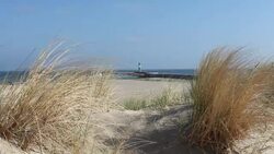 Lighthouse in the dunes Stock Footage
