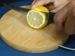cutting lemon into slices Stock Footage