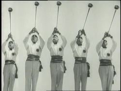 Trumpeters blow a fanfare at the 1932 Olympics. News Clip