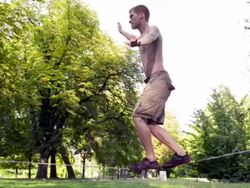 Balancing on slackline Stock Footage
