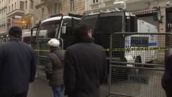 CLEAN : Protestors take down Dutch flag at Istanbul consulate: AFP News Clip