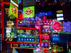 CU Neon signs on Kowloon street, Hong Kong Stock Footage