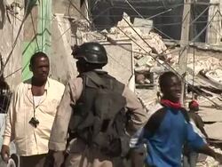 CLEAN: Haitians risk their lives in post-quake looting News Clip