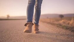 Walking on rural road in nature Stock Footage