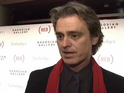 Bono and Damien Hirst Paint the Town Red For Aids In Africa - The (RED) Auction Stock Footage