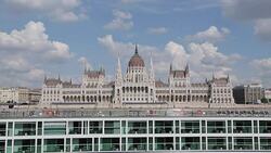 Hungarian Parliament & River Danube Cruise Boat, Budapest, Hungary, Europe Stock Footage