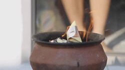 Burning paper item pass to death man Stock Footage