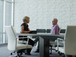 Time lapse of businesswoman interviewing people in conference room / Provo, Utah, United States,  Stock Footage