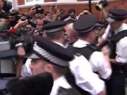 Police Arresting Protesters at Ecuador Embassy News Clip