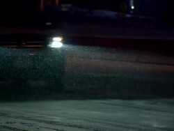 MS Cars moving on snow street at night / Minneapolis, Minnesota, United States Stock Footage