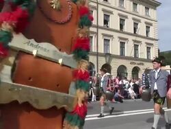 MS PAN Shot of traditional costume parade in Oktoberfest / Munich, Bavaria, Germany Stock Footage