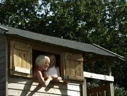 Kids in tree house (Shot on Red) Stock Footage