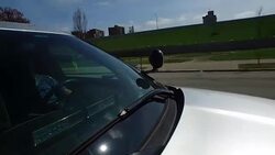 Police car driving down road with sirens in Kentucky News Clip