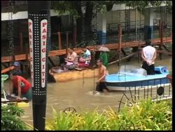 Tens of thousands flee Parma typhoon, as it hits land News Clip