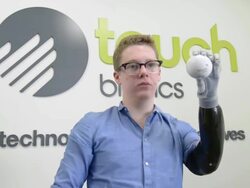 Mid shot of Patrick demonstrating how he can grab Stock Footage