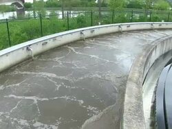 MS POV T/L Shot of Clarifying basin at purification plant / Konz, Rhineland-Palatinate, Germany Stock Footage