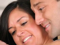 CU TU Mother and Father with Newborn Laying in Hospital Bed / Richmond, Virginia, USA Stock Footage