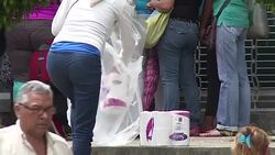 CLEAN : Venezuelans barter nappies for food on smartphones News Clip