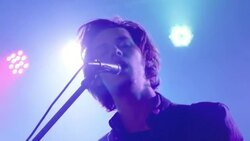 Low angle close up Lead Singer tracking out Stock Footage