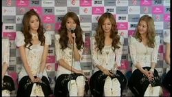 South Korean K-pop girls group Girls' Generation give press conference. Instructional Video