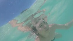 Asian woman snorkeling surface level in sea Stock Footage