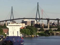 WS View of Kohlbrand Bridge with container ship for container terminal in harbour / Hamburg, Germany Stock Footage