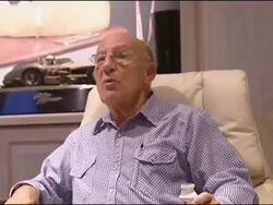 Sir Stirling Moss and his wife, Lady Susie Moss watch television at home Stock Footage