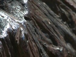 Hoba meteorite edge detail, Namibia: Estimated mass of over 60 tons, it is the largest known meteorite in one piece and the biggest naturally occurring piece of iron on the earth surface. Stock Footage