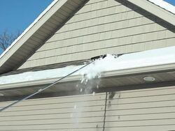 Roof Rake Removing Winter Snow Stock Footage