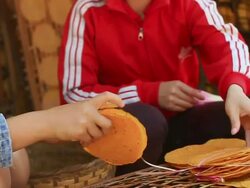 MS SLO MO Shot of woman counting cassava crackers / Luang Prabang, Laos Stock Footage