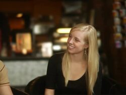 Guys and girl talking at coffee shop Stock Footage