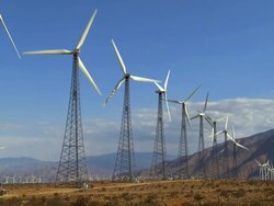 WS, Wind turbines in field with mountains in background, North Palm Springs, California, USA Stock Footage