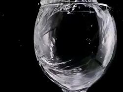 CU SLO MO Shot of Water being poured into glass / Calvados, Normandy, france Stock Footage