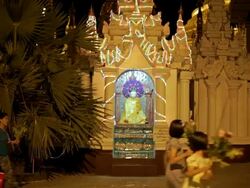 WS View of glowing Buddha statue and temple at night / Yangon, Yangon Division, Myanmar  Stock Footage