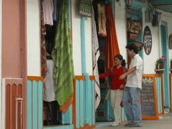 MS PAN Couple stopping to craft shop in town / Salento, Quindio, Colombia Stock Footage