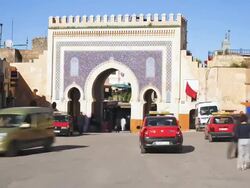 MS T/L  Blue gate of  entrance to medina Souq / Fez, Morocco Stock Footage