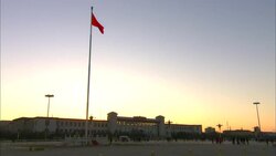 The Chinese flag flies above Tiananmen Square. Stock Footage