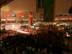 T/L MWA high angle, people moving up and down escalators at busy shopping mall, children playing in play area, makati commercial centre, manila, Philippines Stock Footage