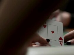 HD DOLLY: Female Player Checking Hole Cards Stock Footage