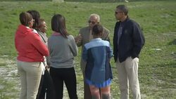 US President and family visit island where Mandela held in prison, protest News Clip