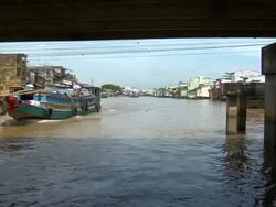WS POV Boat traveling Mekong River, south of Saigon / Vietnam Stock Footage