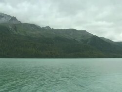 mountain lake changing seasons from summer to fall Stock Footage