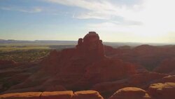 Descend to fly through arch Stock Footage
