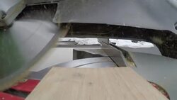 Sawing at board at a 45 degree angle Stock Footage
